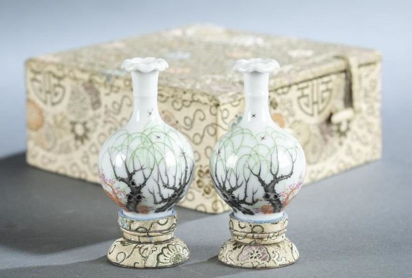 Pair of small baluster form Chinese vases.