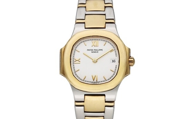 Patek Philippe Reference 4700/5 Nautilus | A yellow gold and stainless steel wristwatch with date and bracelet, Circa 1985