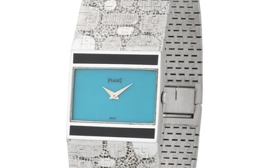 Piaget. Glamorous and Tasteful Lady’s Bracelet Wristwatch in White Gold, Reference 91121A80 With Turquoise Dial and Onyx Decorations