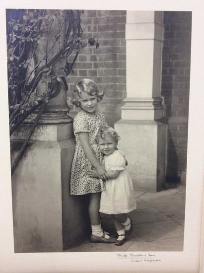 Princess Elizabeth ( later H.M. Queen Elizabeth II ) and Princess Margaret Rose, charming 1932 Frederick Thurston black and white photograph of the young Princesses hugging one another , mounted on...