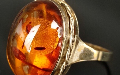 Ring with amber cabochon, natural inclusions, setting 333/8K yellow gold, 1st half 20th century, 4