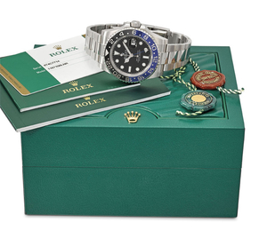 Rolex. An attractive stainless steel dual time automatic wristwatch with date, bracelet, guarantee and box, SIGNED ROLEX, OYSTER PERPETUAL, DATE, GMT-MASTER II, REF. 116710BLNR, CASE NO. 8T4C7714, CIRCA 2016