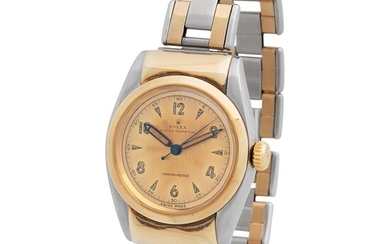 Rolex. Fine and Historic Bubbleback Water-resistant Automatic Wristwatch in Yellow Gold and Steel, Reference 6064, With Hooded Lugs
