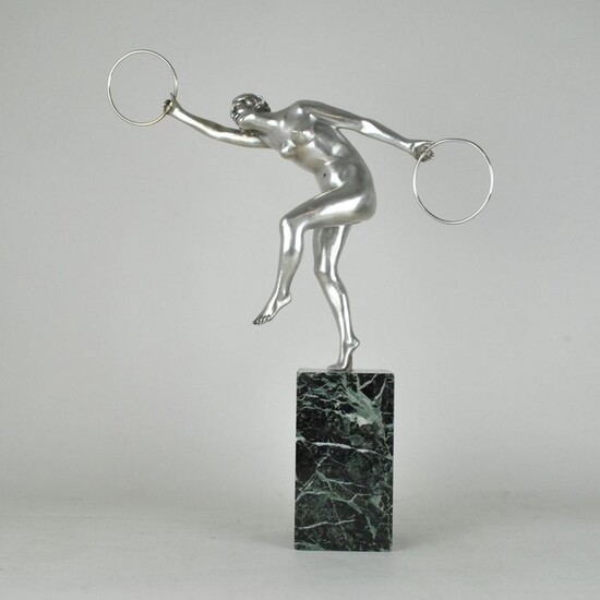 Sculpture, dancer with hoops