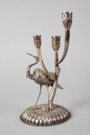 Silver candlestick with heron