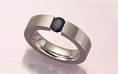 Solid tension ring with sapphire, platinum tested...