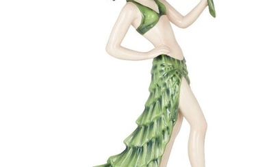 Stefan Dakon (1904-1992) for Goldscheider, 'Rumba' model of female dancer in green skirt and scarf, model no. 8302, circa 1938, Glazed ceramic, Impressed marks 'Goldscheider/Wien/MADE IN AUSTRIA/Dakon', and model numbers '8302/16/31', 32cm high...