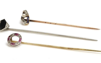 Three Art Deco diamond set stick pins