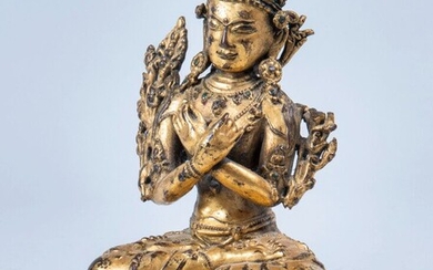 Tibet, XVIe-XVIIe siècle, sujet en bronze doré et rehauts d'incrustations vert foncé, représentant le bodhisattva...