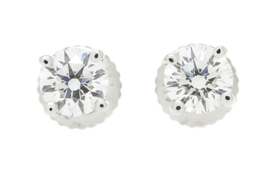 Tiffany & Co, paire de clous d'oreilles or gris 750 sertis de deux diamants, 2 rapports