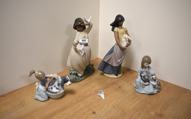 Two Lladro porcelain figure groups comprising 'Bashful Bather' number 5455, and 'Cat Nap' 5640, sold