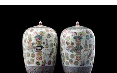 Two famille rose vases with cover, decorated with objects among flowers and peaches China, late Qing dynasty (h. 32.7 cm.)
