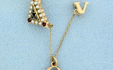 Vintage Acacia Fraternity Garnet and Pearl Pin in 10K Yellow Gold