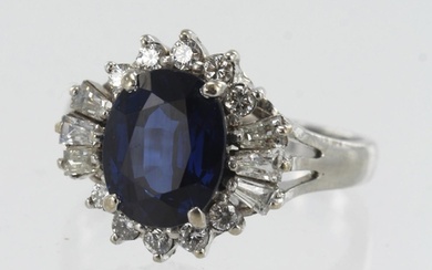 White gold (tests 14ct) diamond and sapphire cluster ring, o...