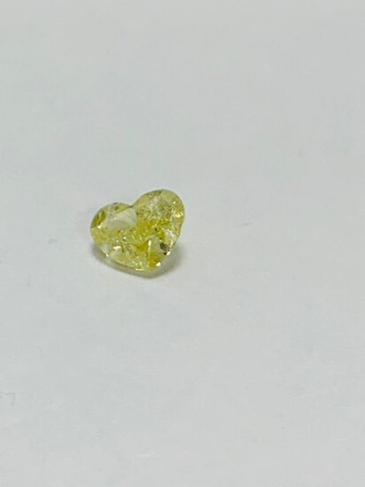 0.87ct natural yellow diamond,heart shape,ai2 clarity low reserve.tested as natural no tretament