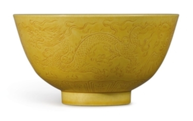 A SMALL YELLOW-GLAZED 'DRAGON AND PHOENIX' BOWL DAOGUANG SEAL MARK AND PERIOD