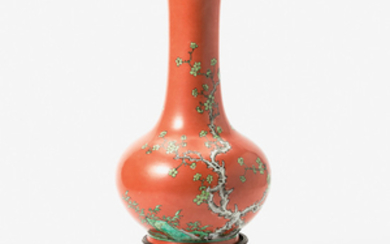 A Chinese coral-ground 'prunus' bottle vase