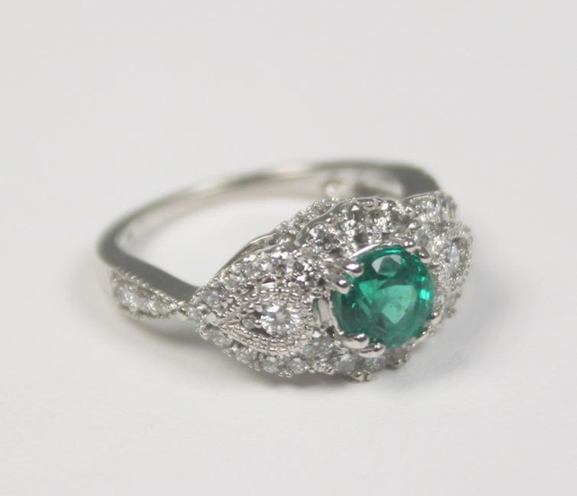14k Diamond and emerald lady's ring