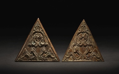 A PAIR OF EXCEEDINGLY RARE SILVER 'MAKARA' PLAQUES SONG DYNASTY