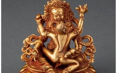 28006: A Buddhist Gilt Bronze Figure of a Deity and Con
