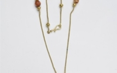 A fine gold collier with an antique pendant