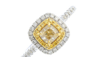 An 18ct gold 'yellow' diamond and diamond cluster ring. View more details