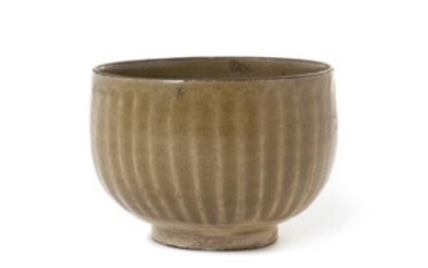 * A Chinese Green Glazed Stoneware Bowl