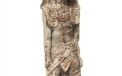 An Egyptian stone standing figure of Anubis,...