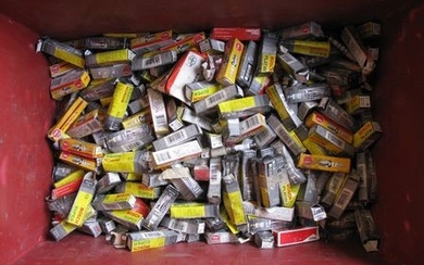 Large crate of new old stock boxed spark plugs from Bosch, NGK and Unipart