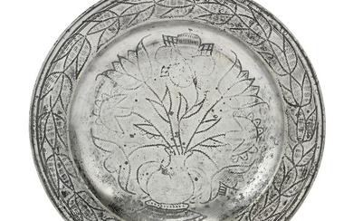 A William & Mary pewter wrigglework-decorated dish, circa 1690