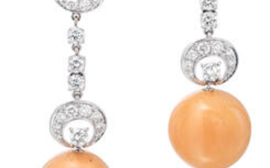 A pair of diamond and melo pearl pendant earrings