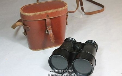 A pair of French made binoculars in leather case.
