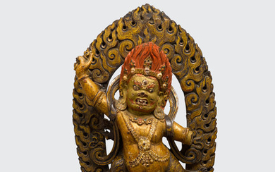 A polychrome gilt lacquered wood figure of Vajrapani