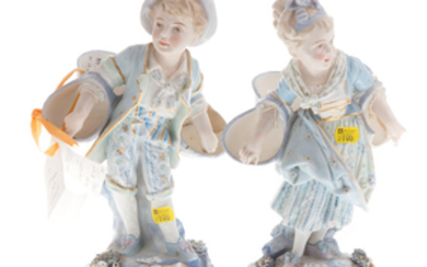 Pair of Continental porcelain peasant figures