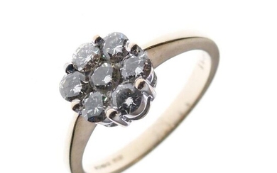 9ct gold and diamond cluster ring of seven stones,...