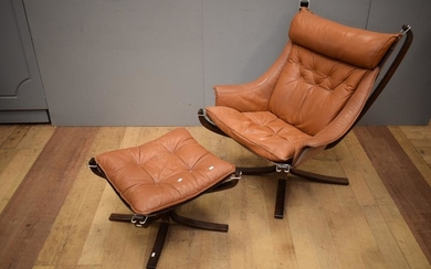 A 1960S DANISH LEATHER FALCON ARMCHAIR WITH OTTOMAN (ottoman missing one bolt)