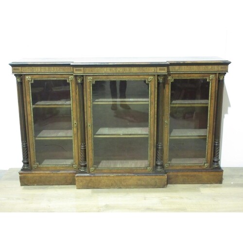 A 19th Century inlaid burr-walnut breakfront Cabinet with gi...