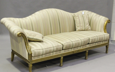 A 20th century giltwood settee, upholstered in modern striped damask, the neoclassical style frame r