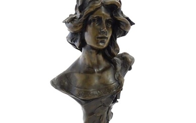A 20thC cast bust depicting an young lady in the Art Nouveau style after Emmanuel Villanis. Approx.