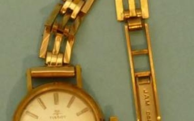 A 9ct Gold Tissot Ladies Circular Wristwatch with matching...