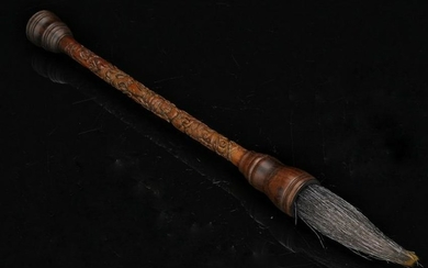 A BAMBOO BRUSH EMBEDED WITH ZITAN WOOD