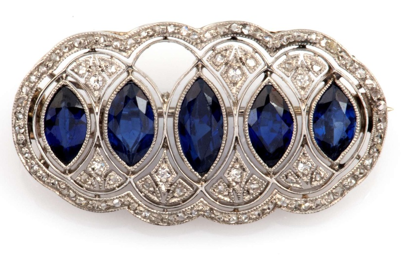 A Belle Epoque platinum sapphire and diamond brooch