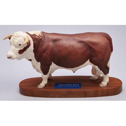 A Beswick model of a Hereford Bull, 1976-1989, wood base, 18...