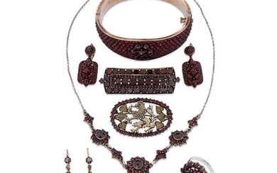 A Bohemian garnet collection seven pieces including a bangle,...