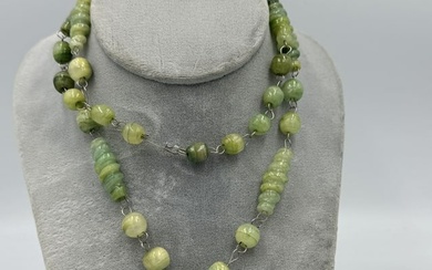 A CARVED JADE NECKLACE W/ PENDANT, 91 GRAMS AND 30" LONG