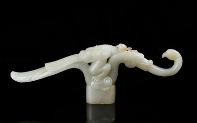 A CARVED WHITE JADE PHOENIX . QING PERIOD