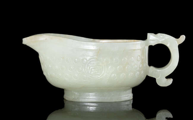 A CELADON AND RUSSET RICE-GRAIN PATTERN LIBATION CUP,...