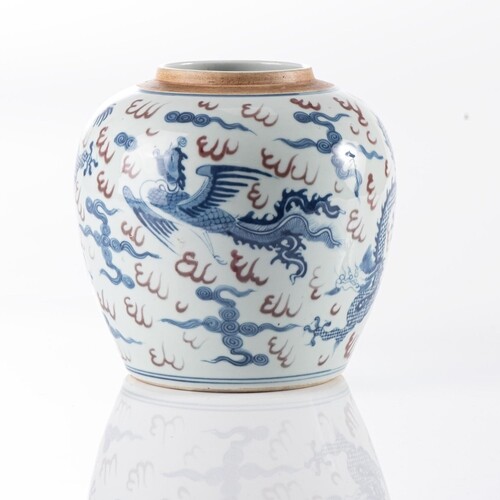 A CHINESE BLUE AND WHITE 'DRAGON AND PHOENIX' GINGER JAR