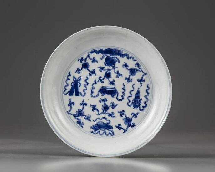 A CHINESE BLUE AND WHITE 'HUNDRED' TREASURES DISH