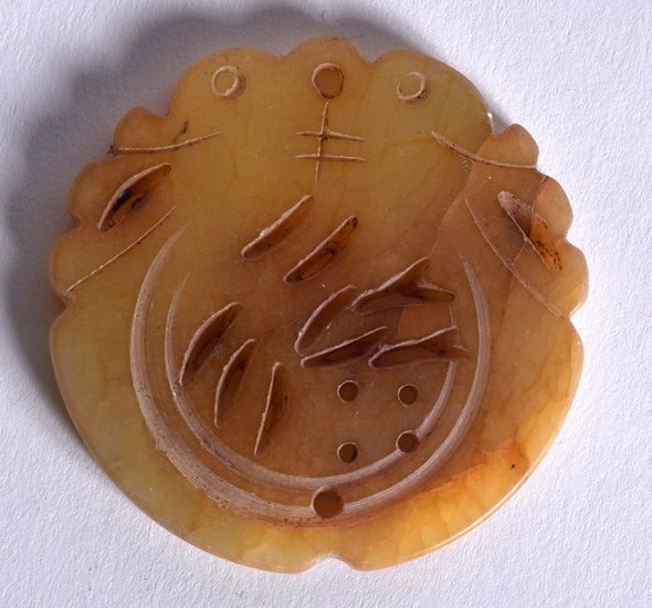 A CHINESE CARVED YELLOW JADE PLAQUE PENDANT, formed as